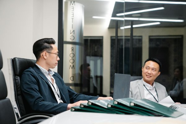 How do UK business laws impact international trade negotiations?